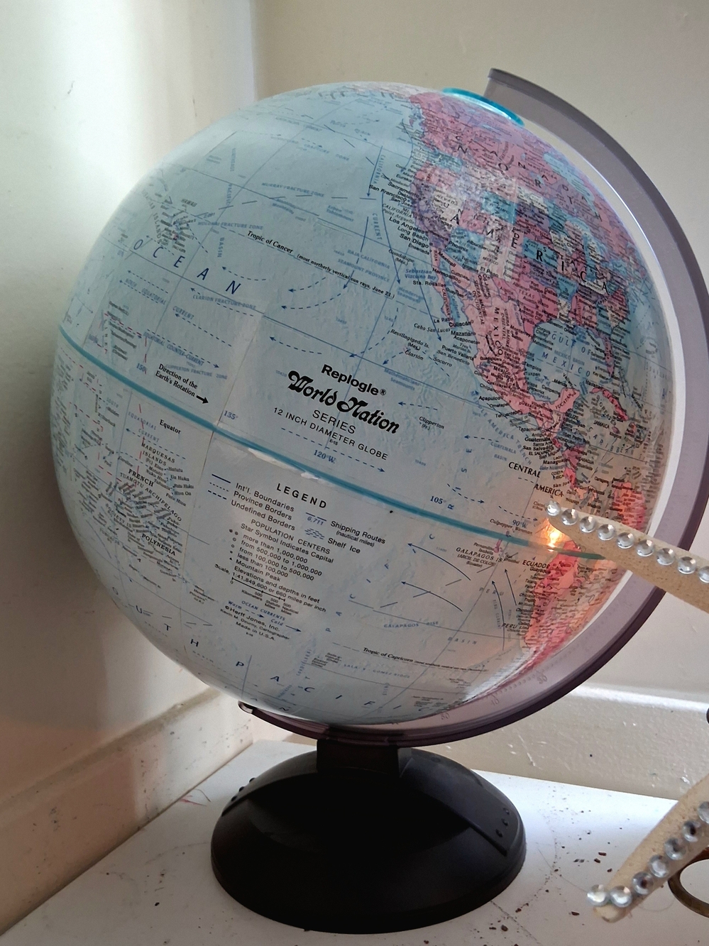 World Station Globe in Light Blue and Pink with Black Base